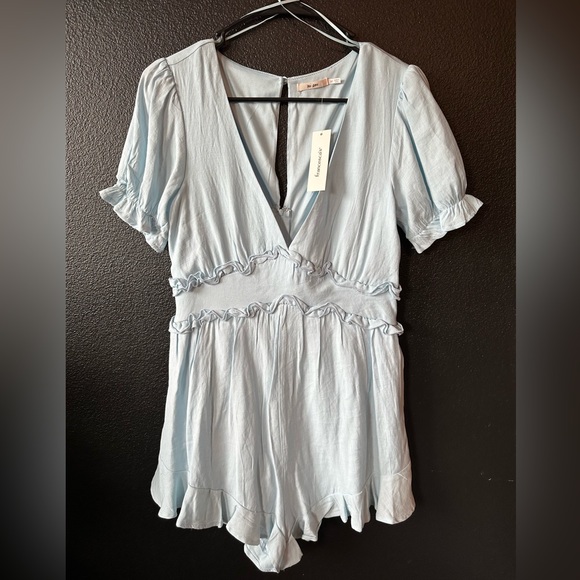 NWT. Light blue ruffle romper. - Picture 1 of 2